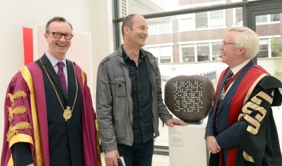 RCSI President, Mr Declan J. Magee (right) , takes a close look at the sculpture "Random Access Memory V" by Remco de Fouw (centre) winner of the 2016 RCSI Art Award , with Mick O'Dea, President of the Royal Hibernian Academy, at the presentation in the RHA. Photograph: Eric Luke / The Irish Times