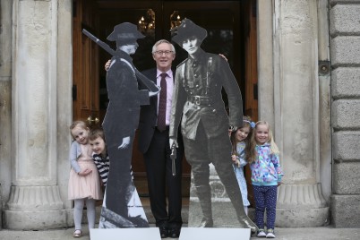 23/03/2016 'Surgeons and Insurgents-RCSI and the Easter Rising' exhibition opens at the Royal College of Surgeons in Ireland on St Stephen's Green, Dublin. Picture shows Mr Declan Magee, President of RCSI with Liam and Karen Bradley (5/4 yrs) Isabelle Reast (5) Lucan and Alice Sheils (4) along with life size cut-outs of Countess Markievicz and Christopher Poole on the steps of RCSI.  This free exhibition explores the human stories of both surgeons and insurgents during Easter Week and is open to the public from 23rd March to April 17th 2016. PIC: NO FEE, MAXWELLPHOTOGRAPHY.IE