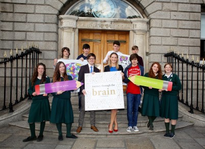 Last week RCSI launched a new colouring book, ’Journey Through The Brain’, which helps young people to understand important issues about the biology of the brain and its connection to emotion and mental health. It outlines key information about the brain in short and simple language making the content of the book accessible to a wide audience. Pictured (l-r front) is Delia Cotter (Santa Sabina Dominican College, Sutton), Joely Brady (Santa Sabina Dominican College, Sutton), Dr Eoin Kelleher who illustrated the book (RCSI graduate class of 2014), Minister Helen McEntee, Fionn Munnelly (Mount Temple Comprehensive School, Clontarf) Aisling O'Kelly (Santa Sabina Dominican College, Sutton), Mia Smith (Santa Sabina Dominican College, Sutton). (l-r back) Donal Cotter (Mount Temple Comprehensive School Clontarf), Jamie Grant-Duggan (St Fintan’s High School, Sutton), Ryan Maher (Mount Temple Comprehensive School Clontarf) and Christian Young (Mount Temple Comprehensive School Clontarf). 