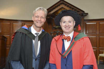 Pictured (right) is Dr Philip O'Halloran, PhD graduate and Valedictorian with his supervisor, Professor Jochen Prehn (left)  Head of the Department of Physiology and Medical Physics, at the Higher Degree Conferring Ceremony which took place on 8th June.