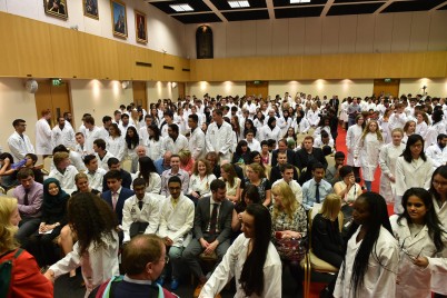 Pictured are new RCSI undergraduate students putting on their white coats for the first time at the Annual Prize-Giving and White Coat Ceremony held in the Exam Hall on Tuesday 8th September.