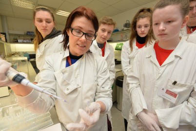 Pictured is Dr Helena Bonner (Physiology & Medical Physics & Centre for Systems Medicine) conducts an experiment while a group of transition year student from schools all around Dublin look on. The students took part in the TY MiniScience programme from 8-11th February at RCSI. The course was run by the RCSI Department of Physiology and Medical Physics and the Centre for Systems Medicine at RCSI.