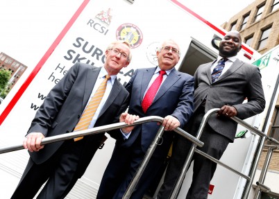 Pictured (l-r) is Mr Declan Magee, President of RCSI; Mr Joe Costello, Minister for State for Trade and Development; and Mr Francis Kaikumba, CEO of COSECSA. The Mobile Surgical Skills Unit will set off from Dublin to Arusha, Tanzania, equipped with surgical training technology such as Virtual Reality simulators to train surgical trainees in hospitals across five of the ten COSECSA countries. 